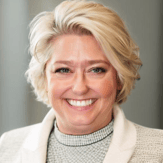 Tammy Kabell Headshot White Suit 2